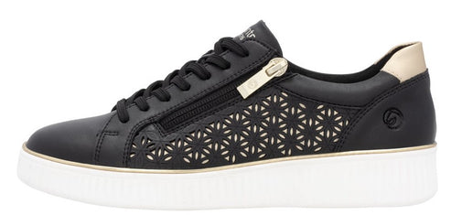 Black sneaker with lace-up and zipper closure and white sole.