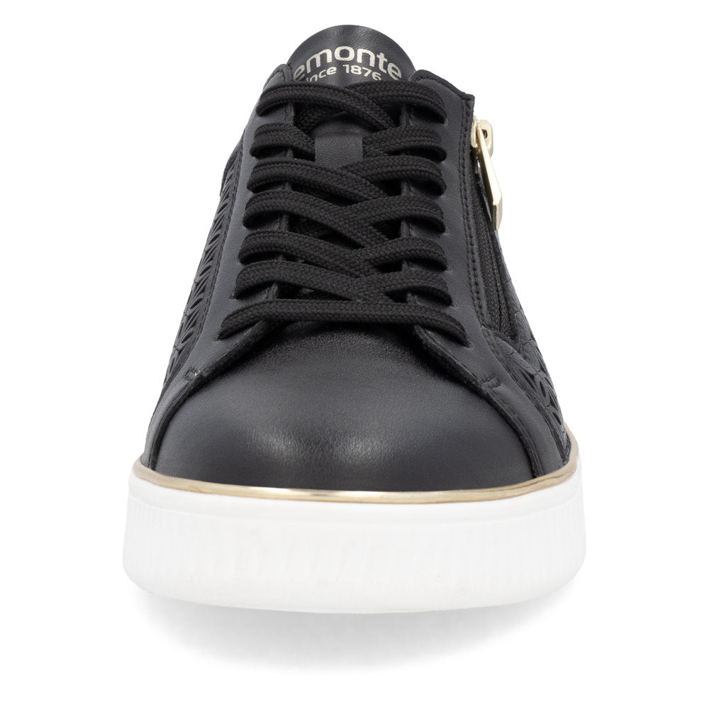 A low-cut, black, lace-up leather sneaker with a white sole and a gold stripe, with the text 'remonte since 1876' visible on the tongue.