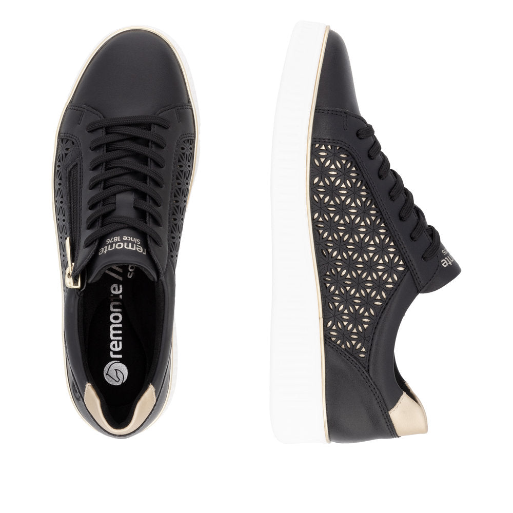 Pair of black Remonte lace-up sneakers with geometric cutouts and a white sole.