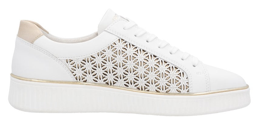 A white leather sneaker with a laser-cut floral pattern on the side and a gold accent stripe.