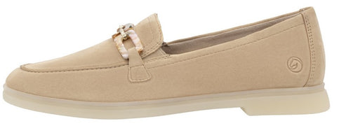 A beige loafer with a decorative chain across the top.
