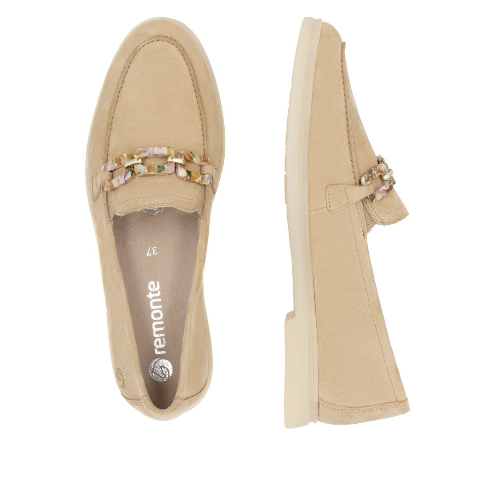 Pair of beige leather loafers with gold and floral chain detail, size 37 visible inside the left shoe.