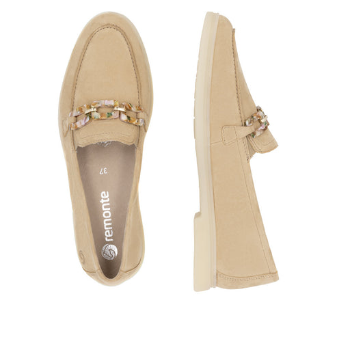 Pair of beige leather loafers with gold and floral chain detail, size 37 visible inside the left shoe.