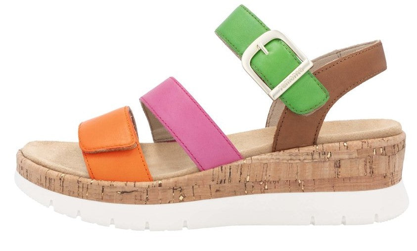 Side view of sandal with orange, pink, green, and brown straps and cork sole.