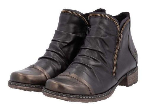 Pair of dark brown ankle boots with side zipper and wrinkled leather.
