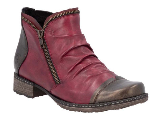 Maroon leather ankle boot with a rounded bronze toe, side zipper, and ruched upper.