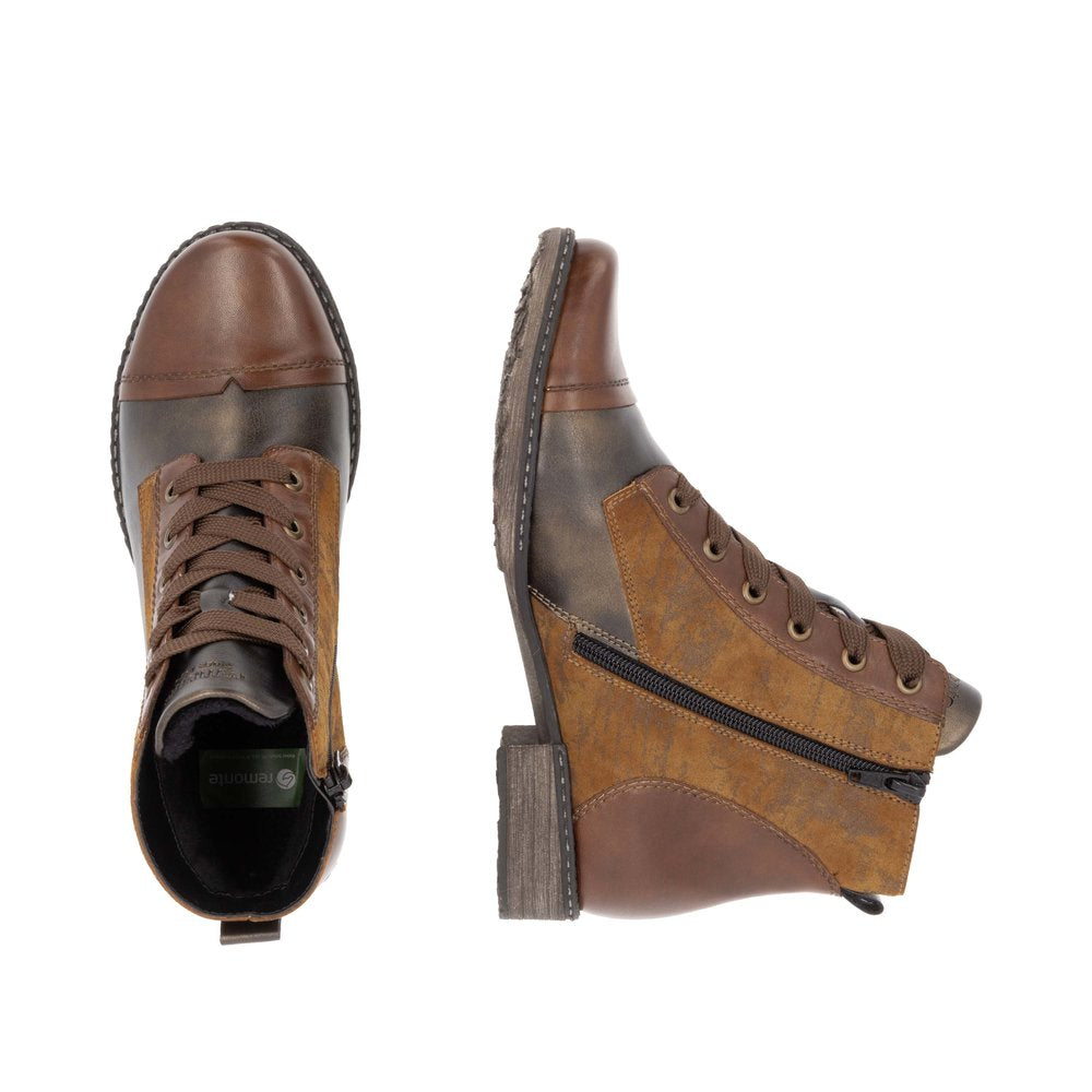 Two brown ankle boots, one viewed from above and one viewed from the side, with laces and zippers.