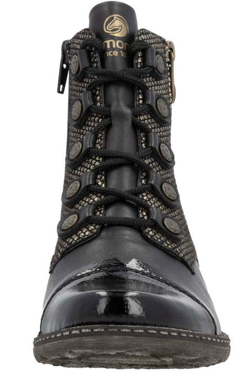 Black ankle boot with decorative buttons, a zipper closure, and a shiny toe cap.