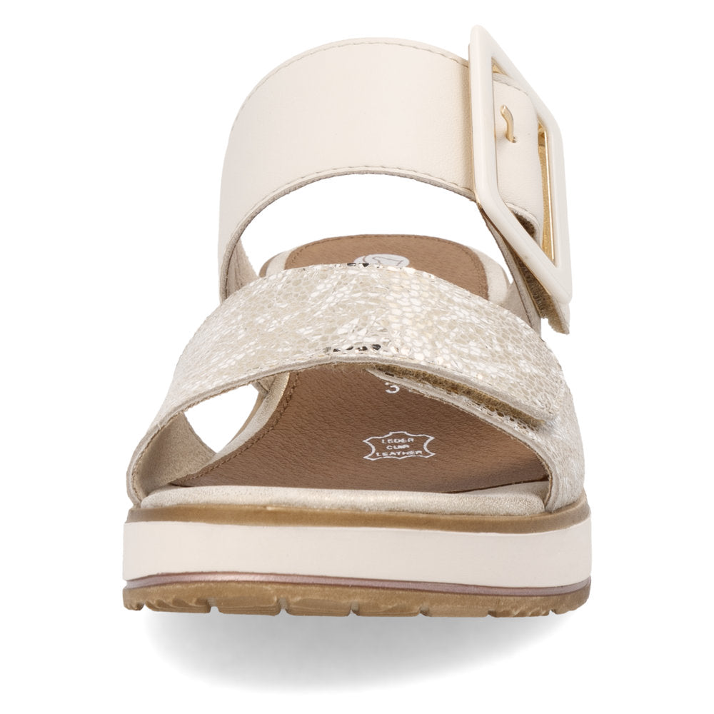 Front view of a platform sandal with off-white wide straps and metallic shimmer.