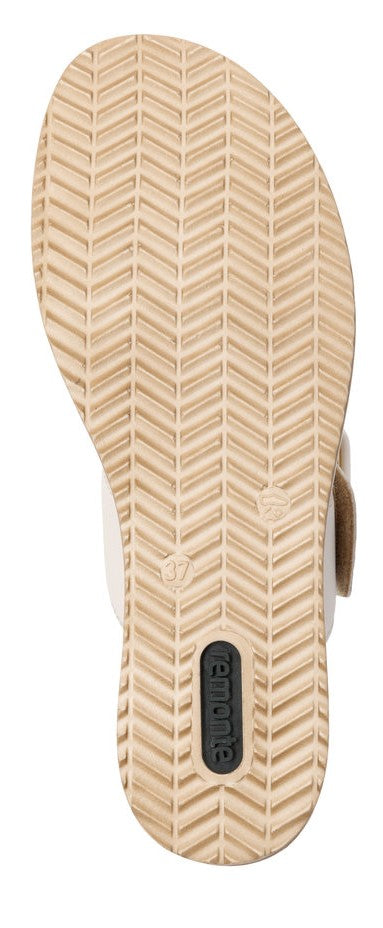 beige sandal bottom with tread and black insert