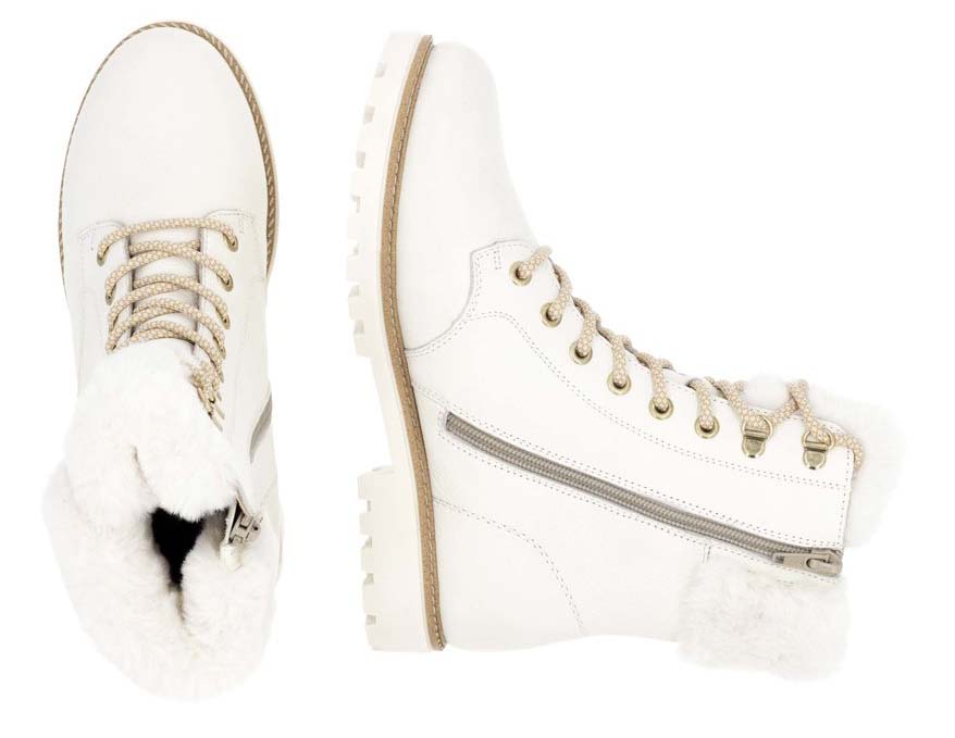 Pair of white leather ankle boots with laces and faux fur trim.