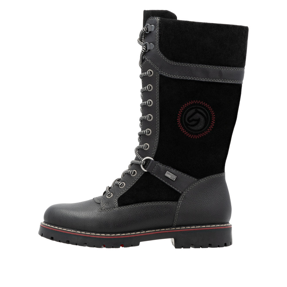 A gray knee-high boot with laces and a black section on the shaft featuring a circular logo.