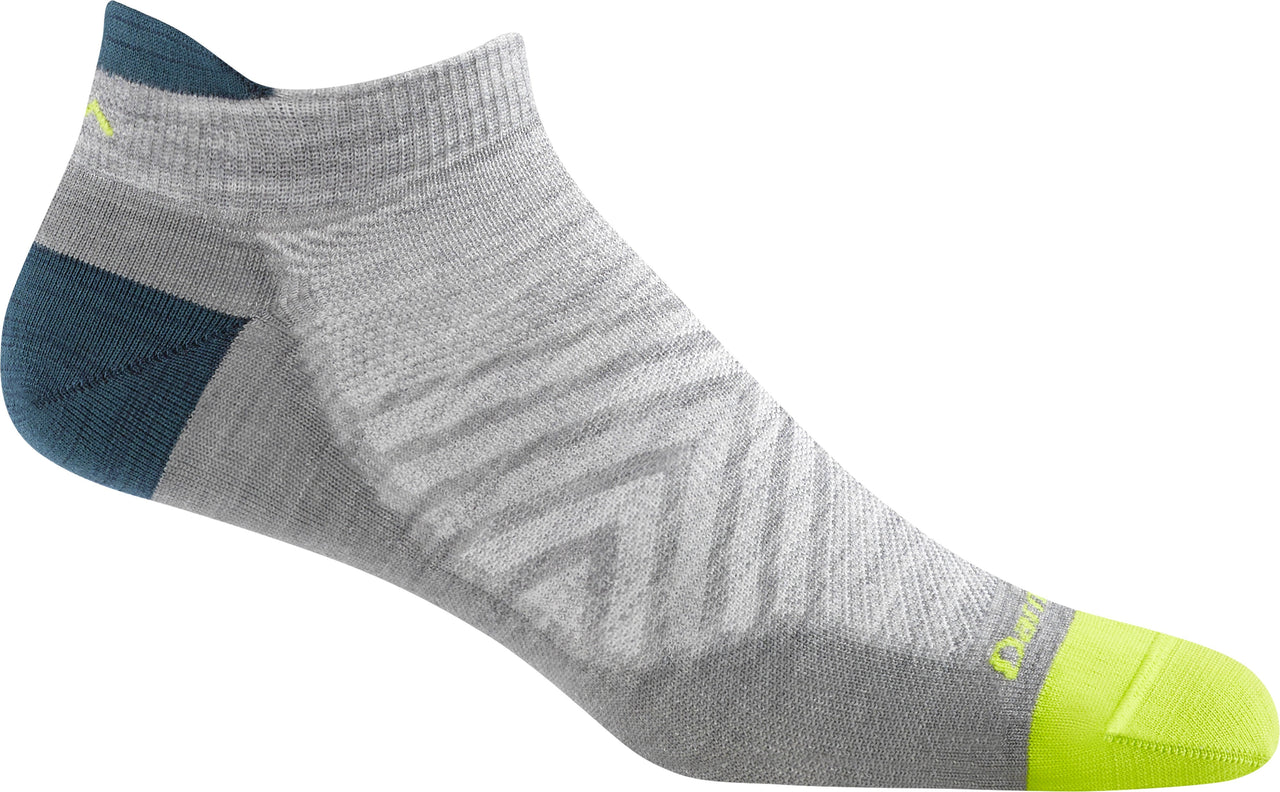 Gray sock with a neon green toe, zigzag design, and teal heel.