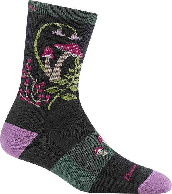 A dark gray crew-length sock featuring a nature-themed pattern with pink-capped mushrooms, light green foliage, and small pink flower-like accents, along with a solid purple heel and toe section.