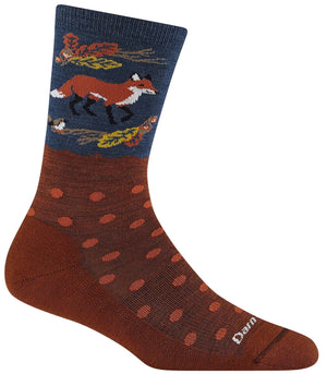 A crew sock featuring a blue upper cuff with a pattern of foxes and autumn leaves, transitioning into a brown foot section decorated with small orange horizontal dashes and the word "darn" written near the toe.