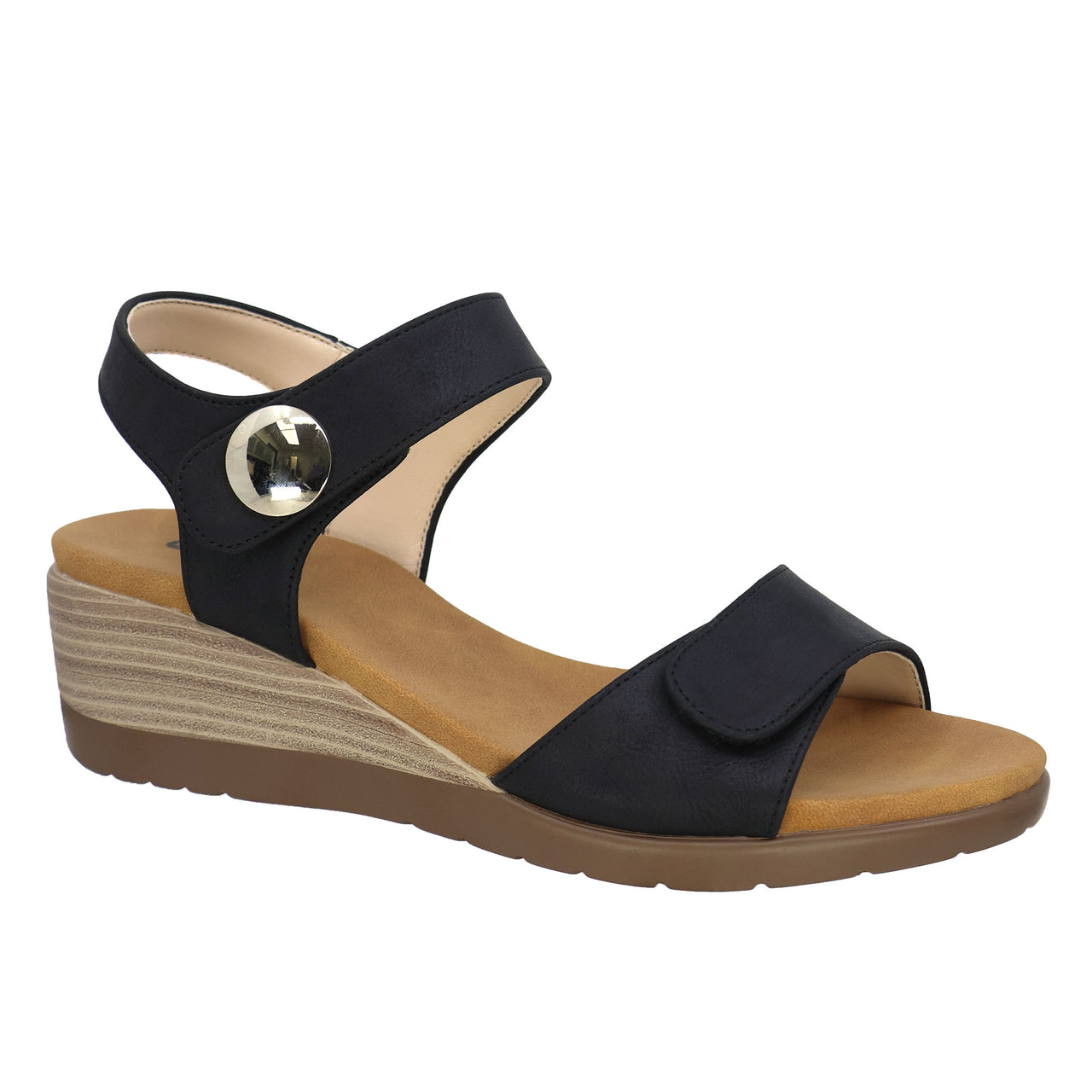Black wedge sandal with adjustable hook and loop straps and decorative button.