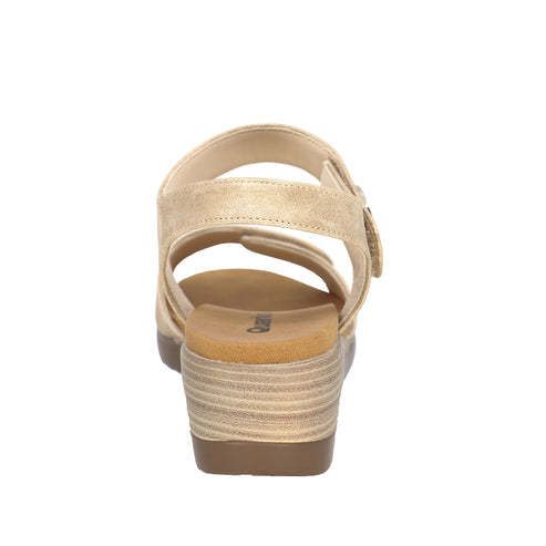 Rear view of gold women's sandal with hook and loop closure.