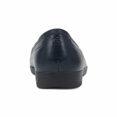 Navy blue leather dress shoe, rear view.