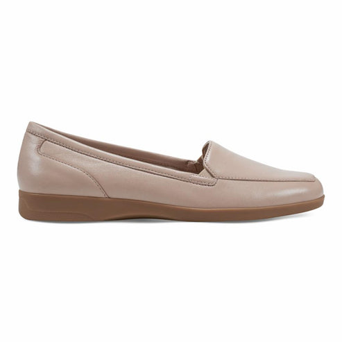 Beige leather loafer with a flat sole.