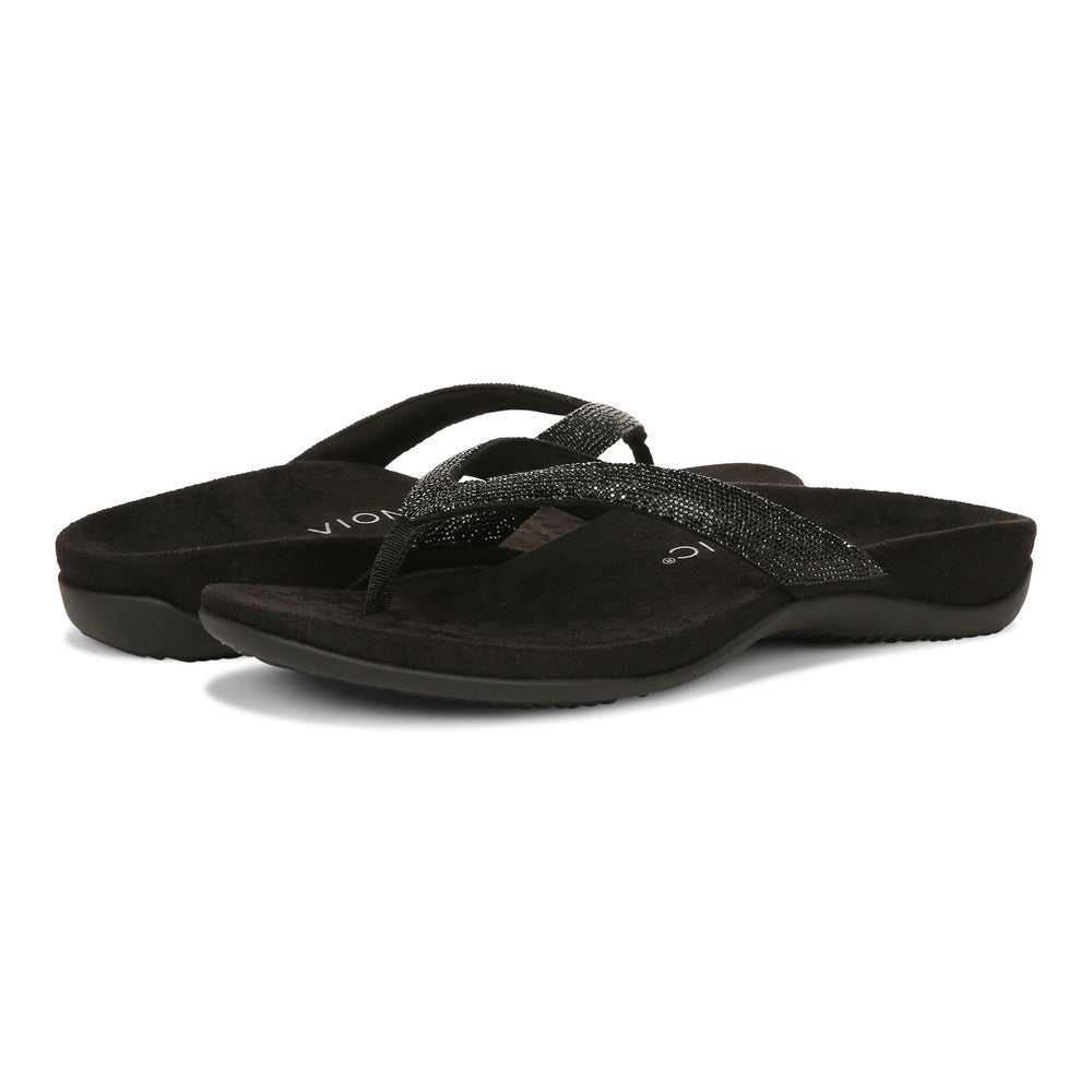 Two black flip-flops with sparkly straps.