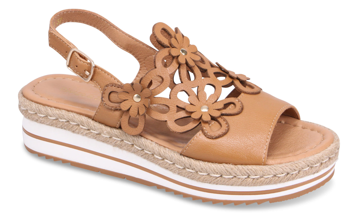 Tan sandal with flower cutouts and white striped platform sole.
