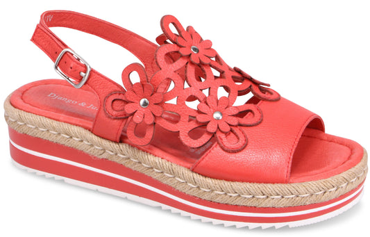 Coral leather platform sandal with flower accents and ankle strap.