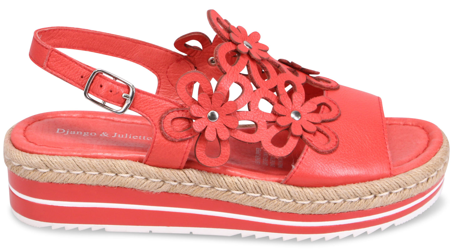 Red espadrille platform sandal with flower details and an adjustable buckle ankle strap.