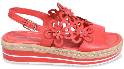 Red espadrille platform sandal with flower details and an adjustable buckle ankle strap.