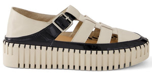 A fisherman sandal featuring a platform sole, a grid-like upper design, and a buckled ankle strap.
