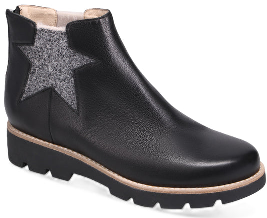 Black ankle boot with a gray star design on the side and a platform sole.