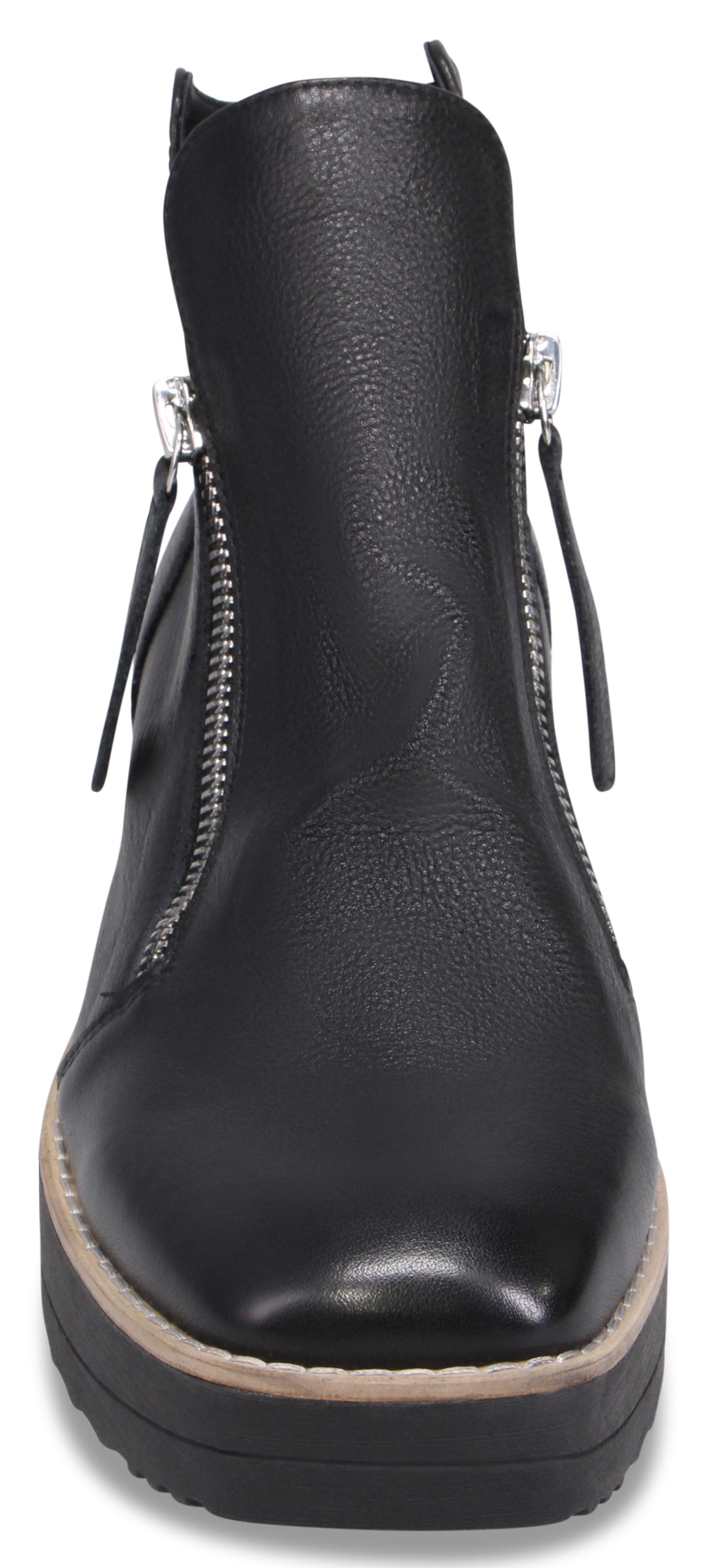 A black ankle boot with a chunky, stacked sole, featuring a square toe and silver dual side zippers with pull tabs.