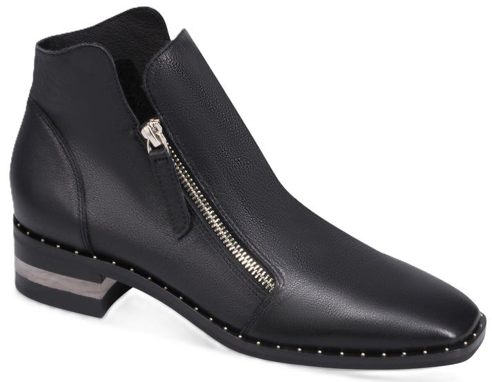 Black leather ankle boot with a silver zipper closure, a low block heel with a thin silver accent, and silver studs along the sole.