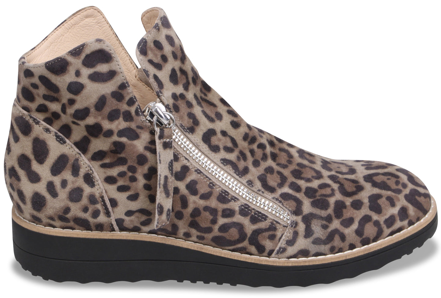 A leopard-print ankle boot with a slanted silver-tone side zipper, a rounded toe, and a low, thick, black rubber wedge sole.