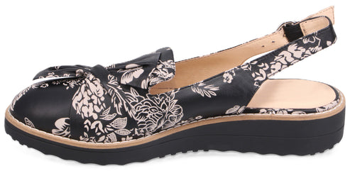 Floral print slingback shoe with a bow.