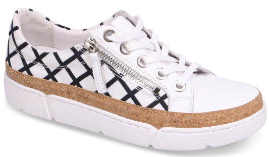 A low top white sneaker with black diamond pattern, side zipper, lace up closure, and cork trim.
