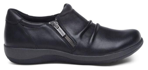 A women's black leather shoe with a side zipper.