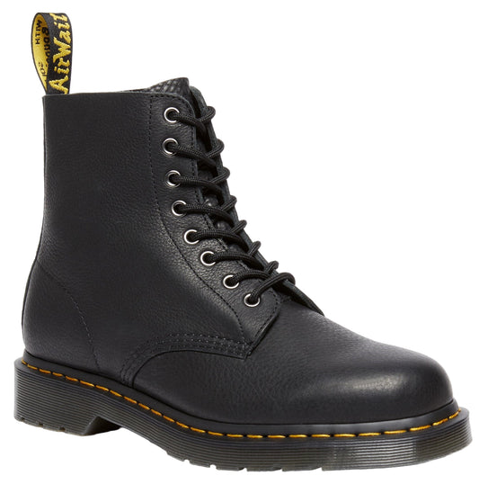 A black leather boot with yellow stitching and black laces.