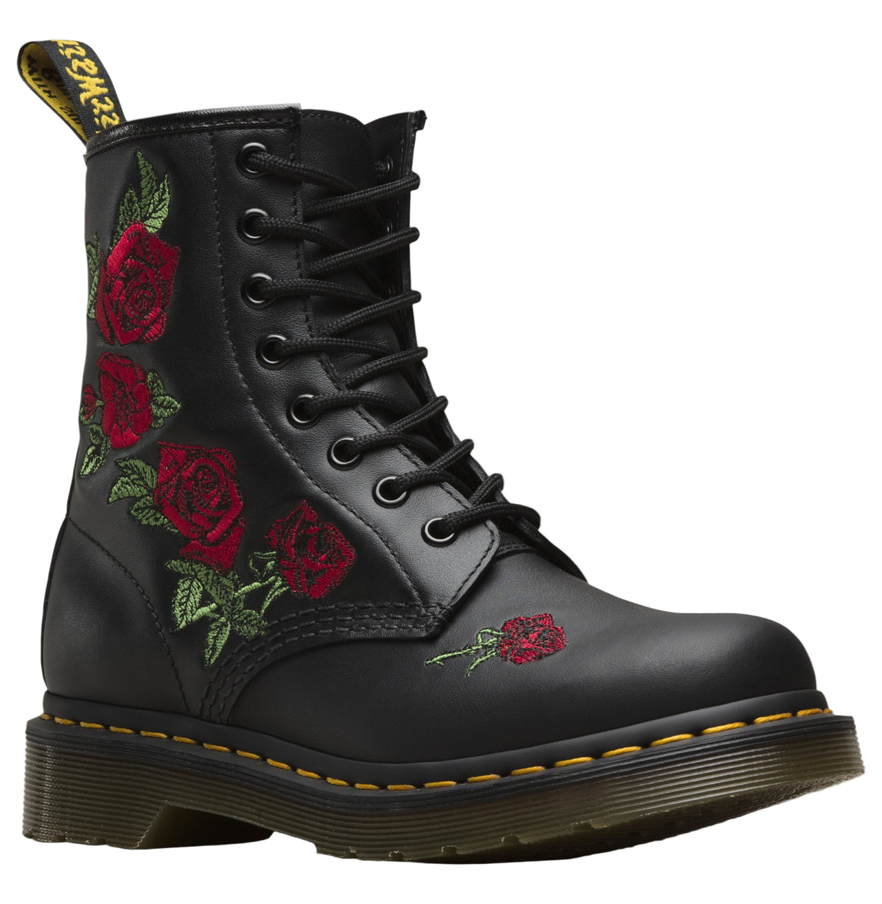 Black boot with embroidered red roses.