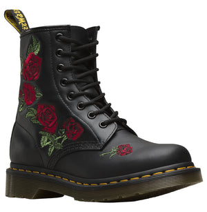 Black boot with embroidered red roses.