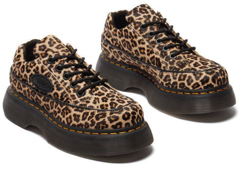 Leopard-print shoes with black soles and laces, and yellow stitching.