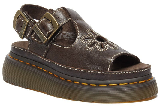 Brown leather platform sandal with open toe, flower cutout, buckled slingback strap, and contrast stitching.