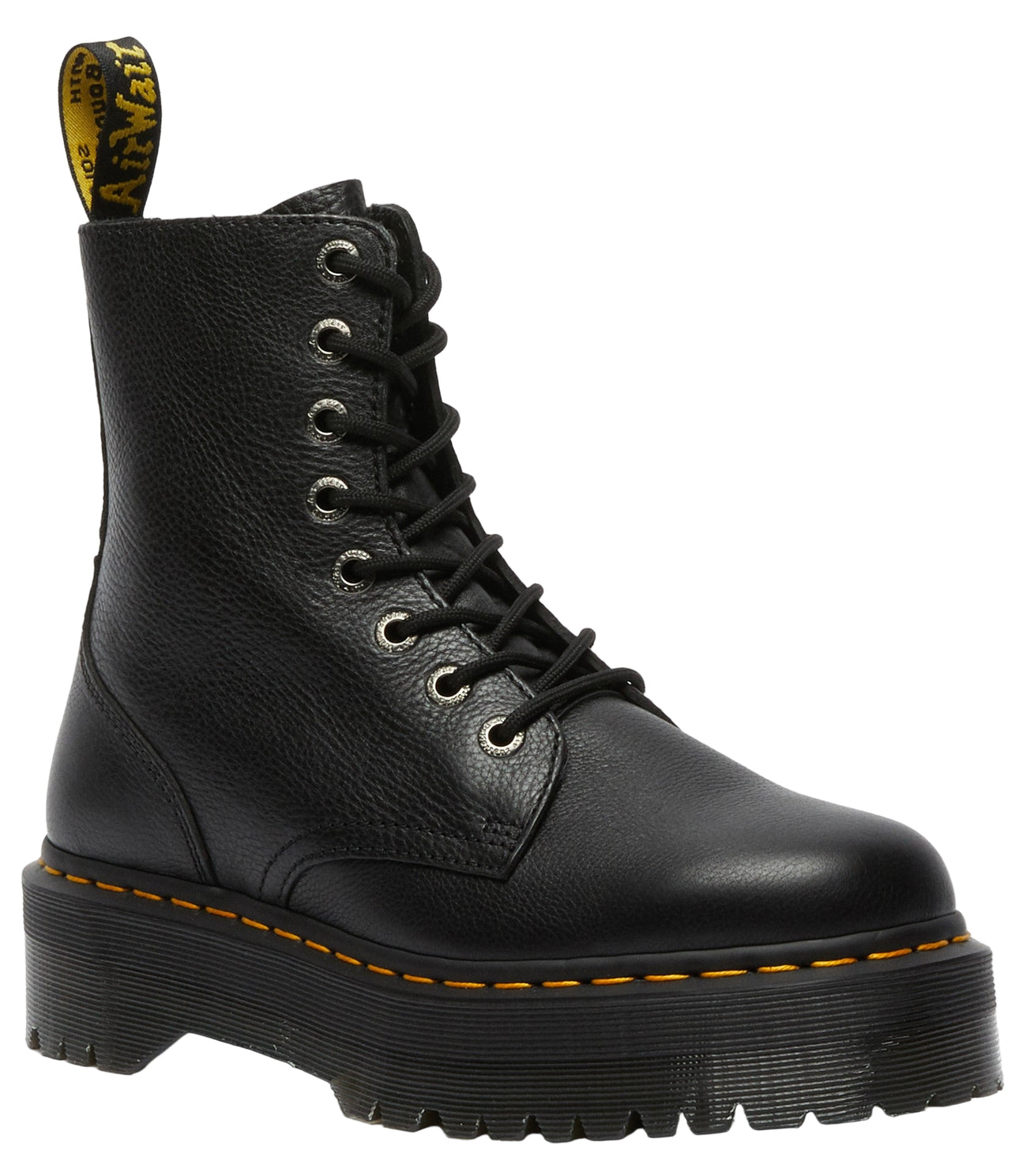 Black platform boot with yellow stitching and a yellow and black pull tab.