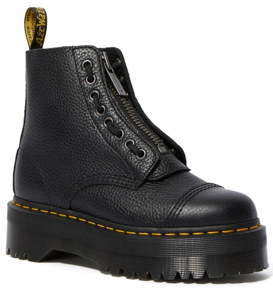 A black, pebbled-leather ankle platform boot with a front zipper closure, a cap toe, yellow welt stitching, and a branded pull loop at the heel.
