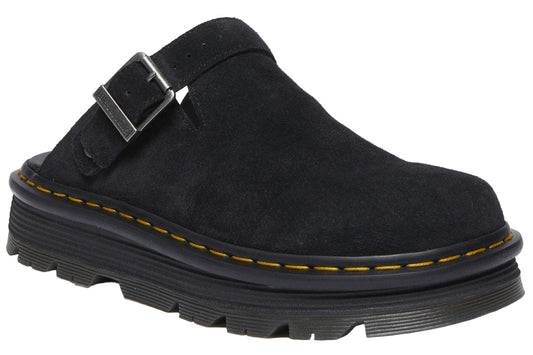 Black suede mule with an adjustable buckle strap and a thick, ridged sole.