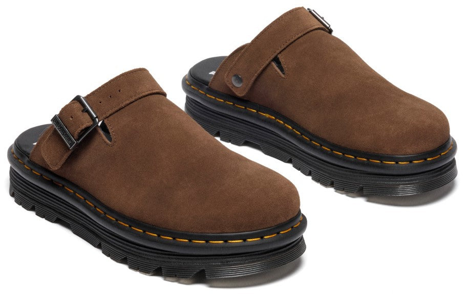 Pair of brown suede platform clogs with adjustable straps and black soles.