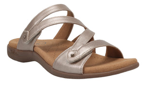 Champagne colored sandal with adjustable straps and a molded footbed.