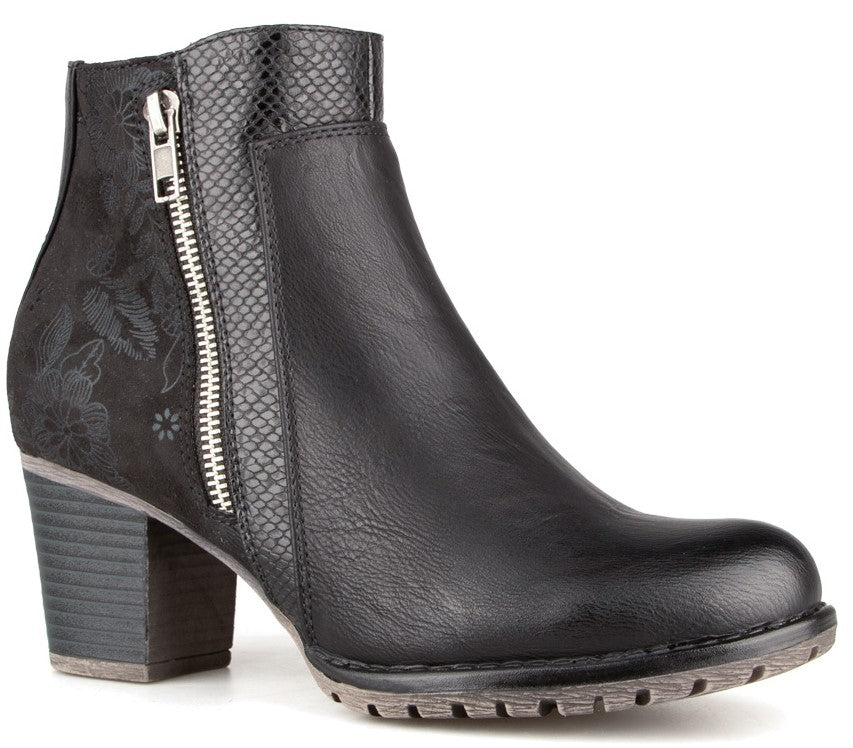 A black ankle boot with a block heel, featuring a silver side zipper, a snake-print panel, and a floral embossed detail on the heel section.