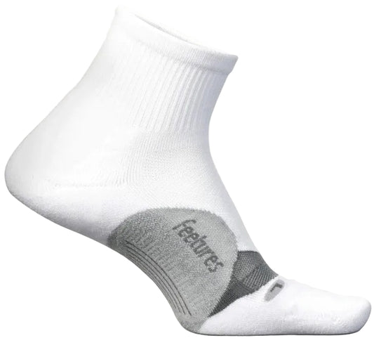 A white athletic quarter-length sock with grey supportive arch cushioning and the word feetures printed on the arch.