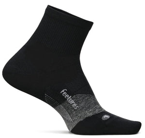 A black ankle-length athletic sock with a gray textured mid-foot panel, displaying the brand name "feetures" in white text and a small white "L" on the top of the toe area.