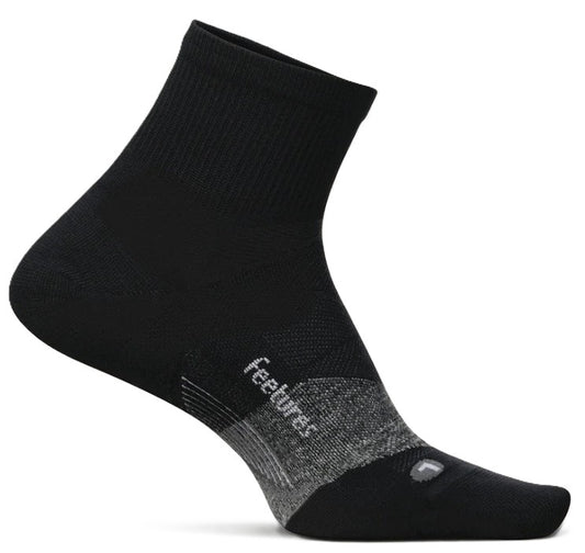 A black ankle-length athletic sock with a gray textured mid-foot panel, displaying the brand name "feetures" in white text and a small white "L" on the top of the toe area.